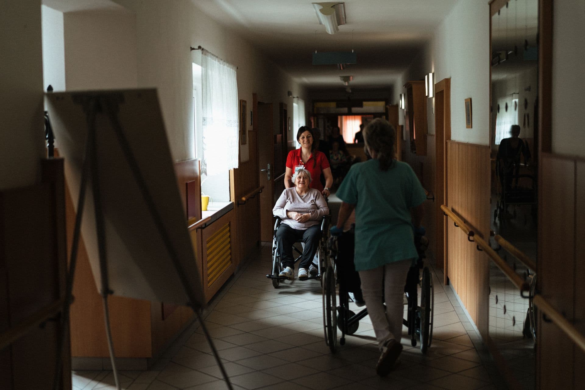 Care team members supporting residents between shifts